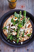 Paneer with grilled asparagus, chillis and mint on a flatbread