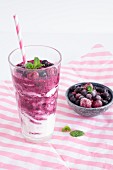 A berry smoothie with yoghurt and peppermint