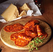 A snack of chorizo and Parmesan cheese