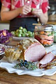 A country style Christmas buffet with ham, mustard and brussels sprouts (Sweden)