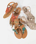 Three pairs of bejewelled sandals
