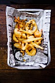 Seafood tempura on a piece of newspaper