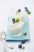 Vanilla cream with blueberries and mint