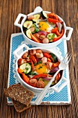 Sausage and vegetable bakes with fried eggs