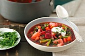 Minestrone with young beetroot, green beans, potatoes and a dollop of cream