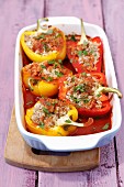 Stuffed peppers with rice and pork in tomato sauce