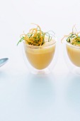 Carrot soup with ginger and vegetable straw