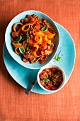 Red tagliatelle with tomato sauce