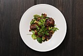 Chicken liver and wild herb salad with caramelised walnuts and chorizo