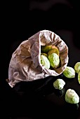 Brussels sprouts in a paper bag