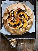 Squash and kale galette with pine nuts