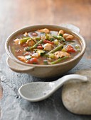 Vegetable soup with beans and courgette