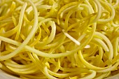 Yellow courgette pasta (close-up)