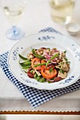 Tuna salad with beans, tomatoes and onion
