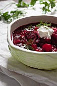 Borscht with dill and a dollop of sour cream