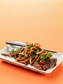 Stir-fried lamb with vegetables and cumin (Asia)