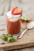 Strawberry fruit desert with rhubarb, chia seeds and soya cream (vegan)