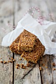 Gluten-free vegan muesli bars with nuts and lupine flakes