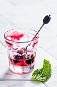 Elderflower jelly with blackcurrant compote