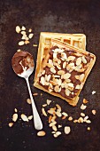 Waffles with chocolate cream and flaked almonds