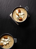 Cream of garlic soup with cream and croutons