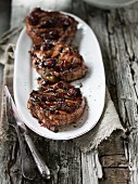 Grilled veal chops with a cherry marinade