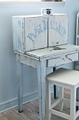 Shabby-chic fold-out writing desk with cupboards on top