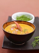 Cream of lobster soup with dill