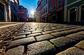 Cobbled street and sunlight