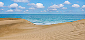 Sand dunes and sea