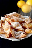 Lemon biscuits dusted with icing sugar