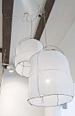 Pendant lamps with fabric lampshades on wire frames
