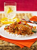 Spicy chicken with ginger, vegetables and rice (Jamaica)