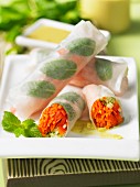 Vegetarian rice paper rolls with yellow coconut curry sauce (Thailand)