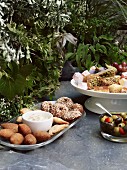 A picnic of mezze, olives, baklava and Turkish delight