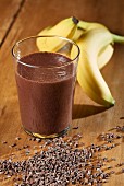 A Banana and chocolate smoothie with ingredients