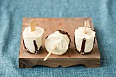 Homemade vanilla ice cream sticks with chocolate glaze