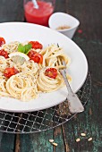 Spaghetti with oven-baked cherry tomatoes