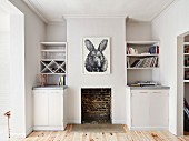 Surreal drawing of animal above open fireplace with white shelves and cupboards fitted in niches either side