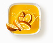 Oranges with a splash of juice