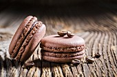 Coffee macaroons on a wooden table