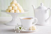 Coconut pralines served with coffee