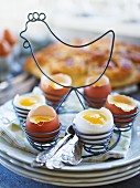 White chocolate mousse with peach slices in eggshells
