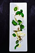 Mozzarella with basil, pepper and olive oil