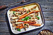 Oven-roasted carrots and parsnips with walnuts