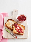 Strawberry jam and butter on toast