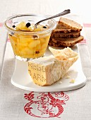 Pear compote with chocolate served with Parmesan cheese and bread