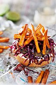 Lentil burger with red cabbage and sweet potato chips