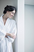 Woman relaxing in bathrobe