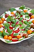 Tomato and mozzarella salad with basil (close-up)